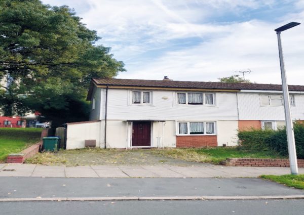 A pair of houses for sale by auction